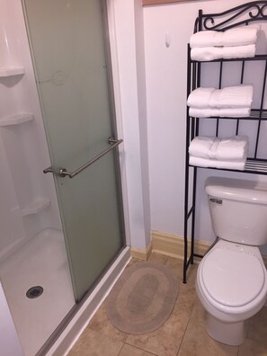 Shower, hair dryer, towels, soap - King One Bedroom, Converted1894 Historic Hotel, Downtown Buffalo Wyoming (Buffalo)