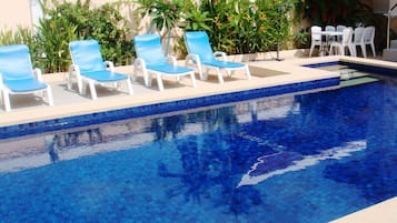 Outdoor pool, open 8:00 AM to 10:30 PM, pool umbrellas, sun loungers