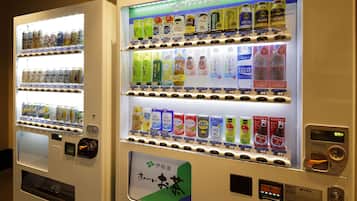 Vending machines with various beverages and snacks.