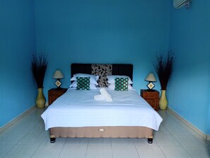 Kamar Double Deluks (Air Conditioning) | Tempat tidur tambahan