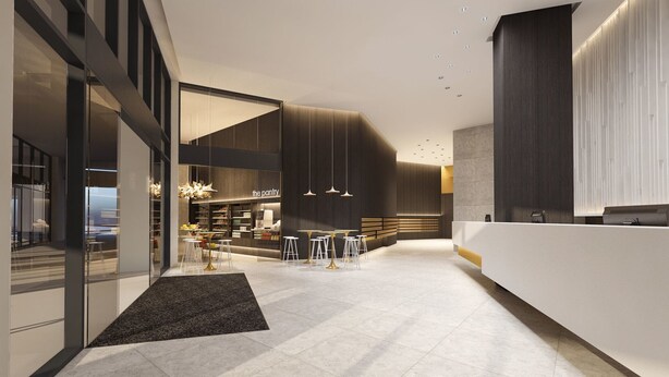 A modern hotel lobby with a reception desk, seating area, and a large glass wall offering a view of the cityscape. - Alcyone Hotel Residences (Hamilton)