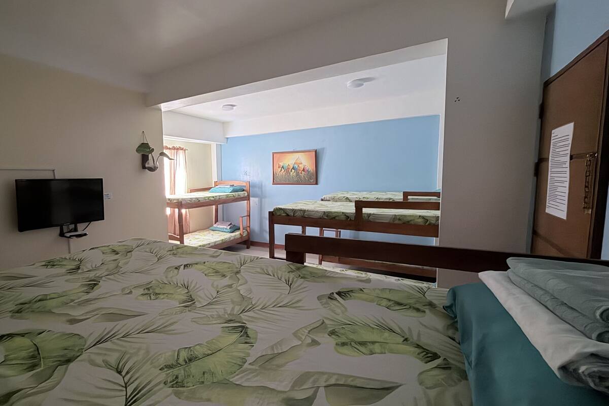 Family Room for 8 Persons, Non Smoking, Private Bathroom | Desk, bed sheets