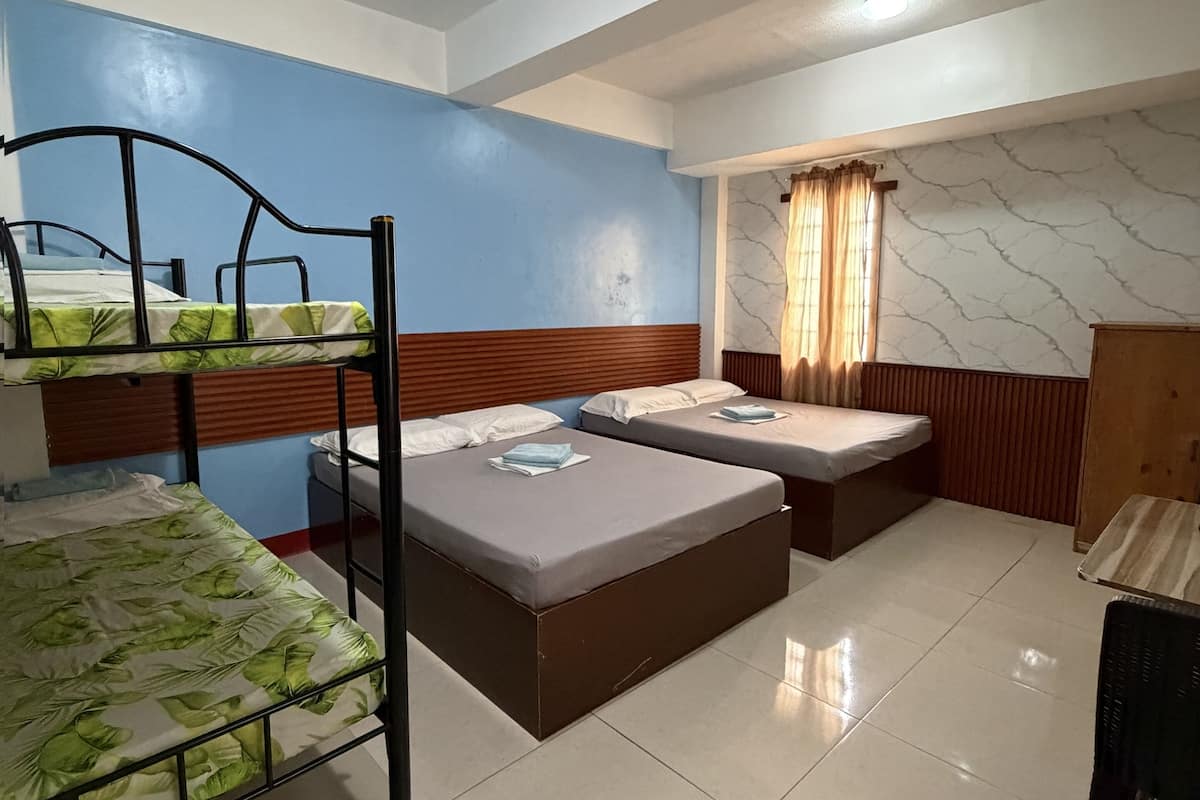 Family Room For 6 Persons, Non Smoking, Private Bathroom | Desk, bed sheets