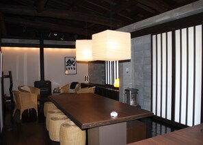 Two-Bedroom + Japanese-Style Room Holiday Home | Living area | Flat-screen TV