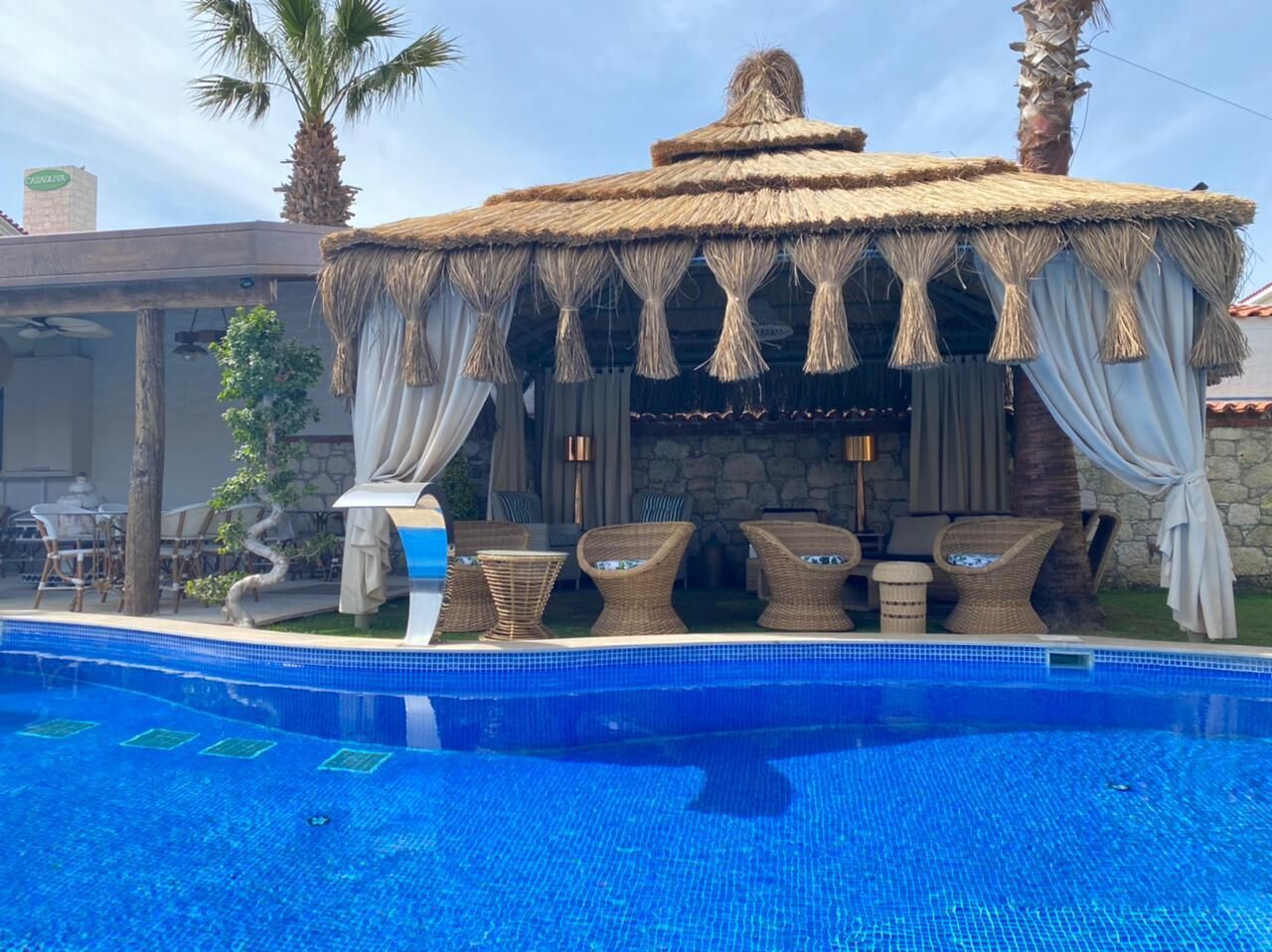 outdoor pool, pool umbrellas, pool loungers