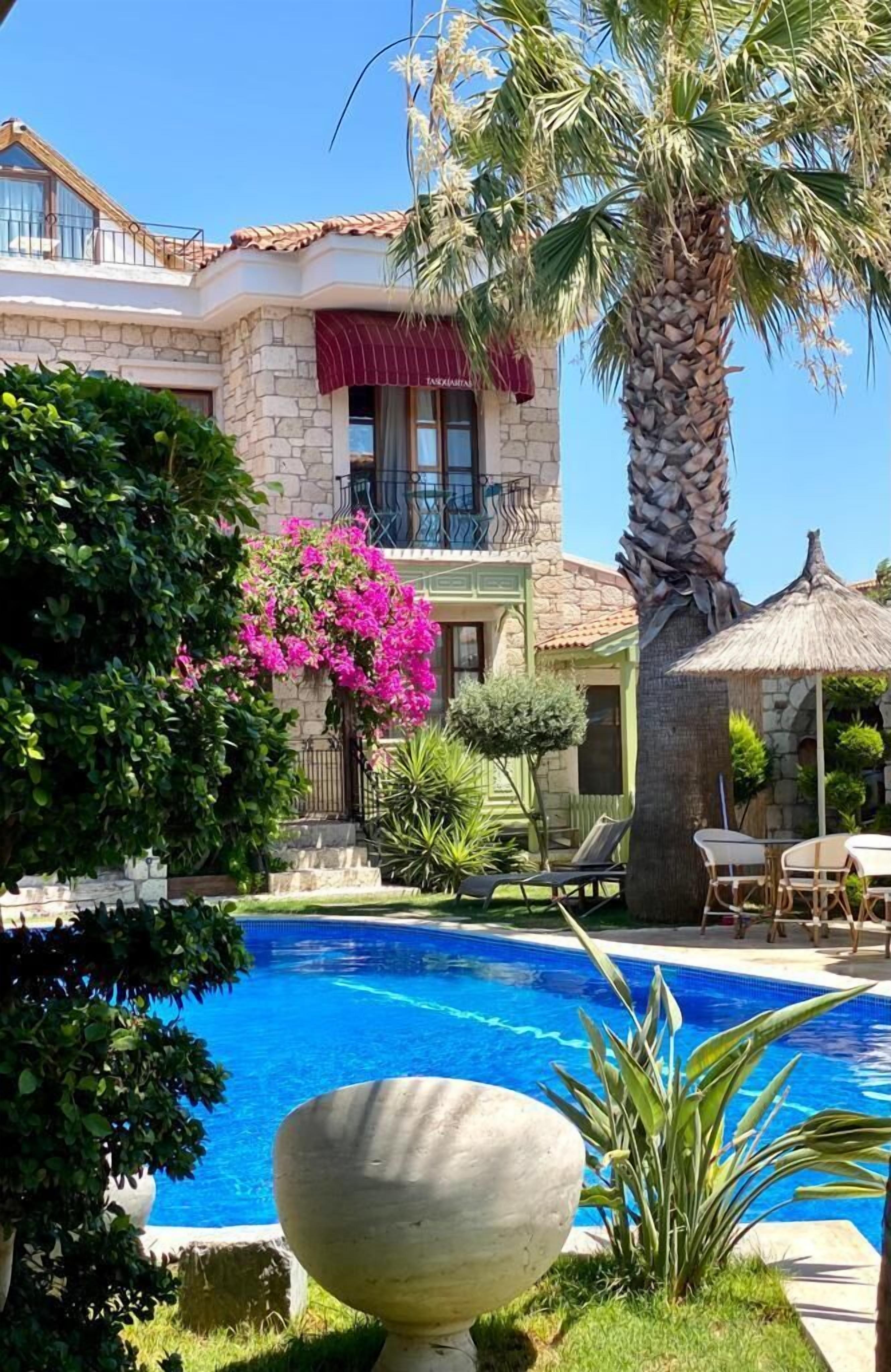 outdoor pool, pool umbrellas, pool loungers