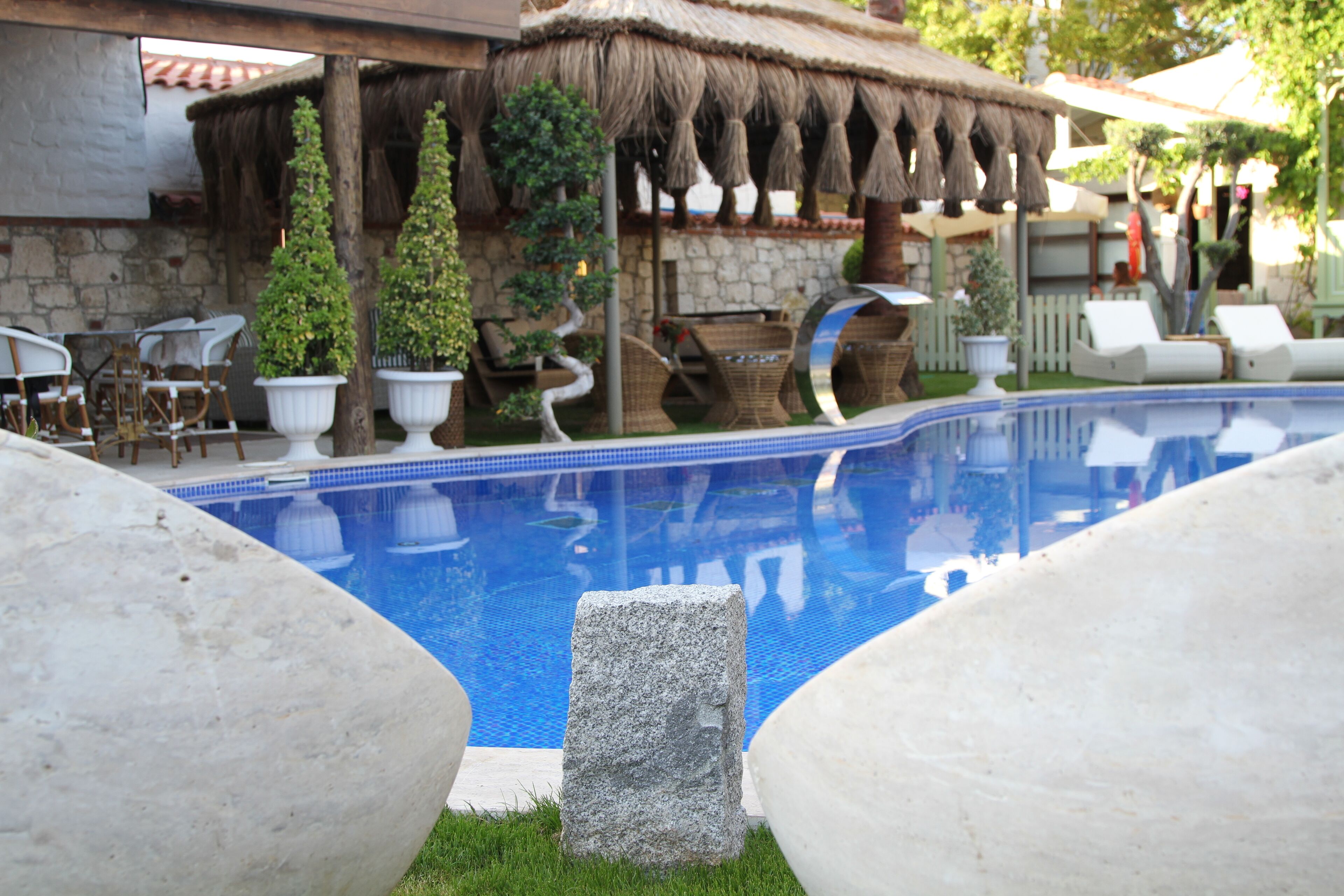 outdoor pool, pool umbrellas, pool loungers