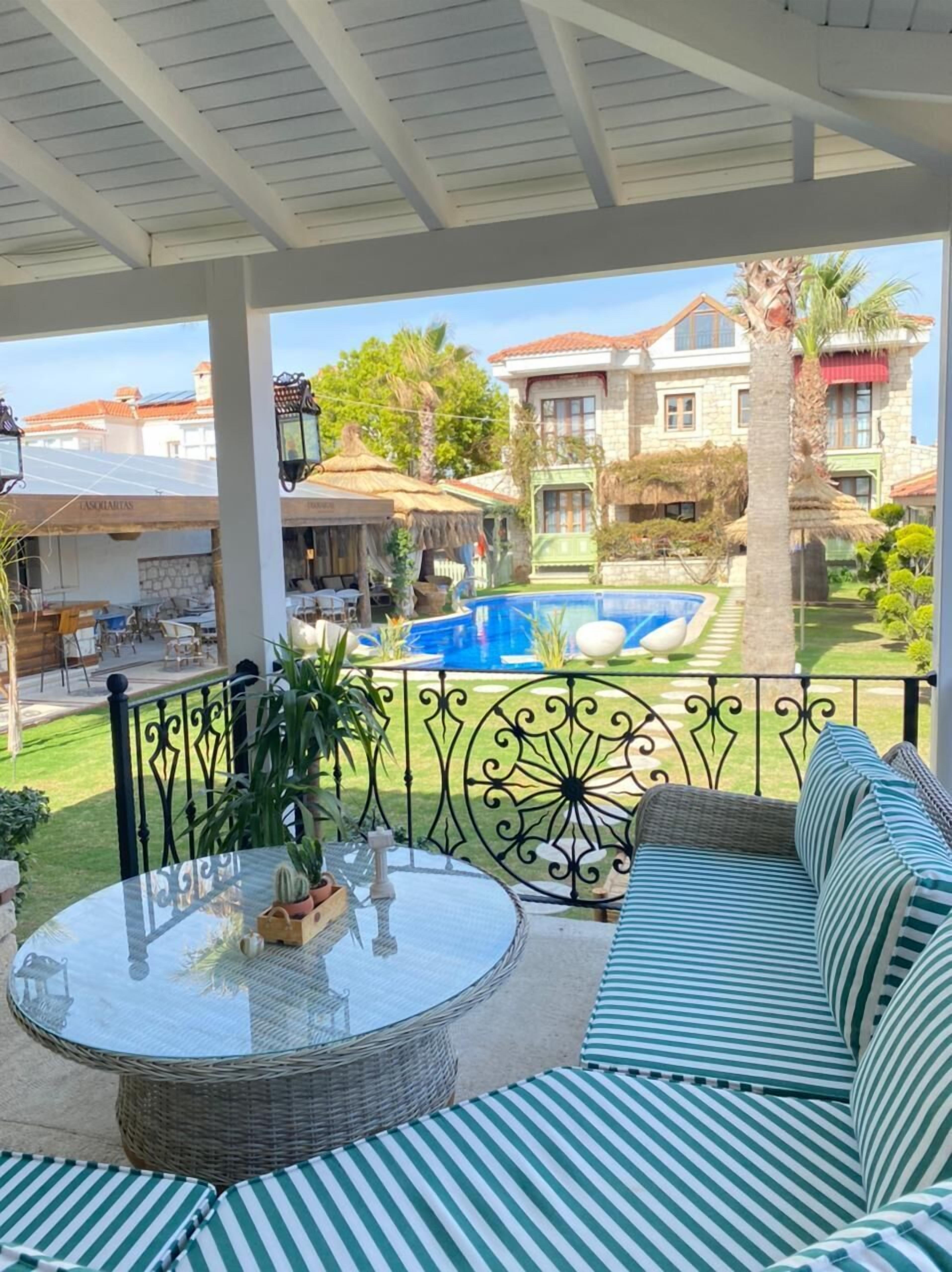 outdoor pool, pool umbrellas, pool loungers