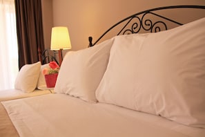 Premium bedding, in-room safe, desk, soundproofing