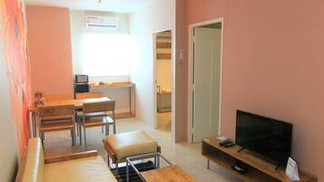 Premium Apartment, 2 Bedrooms, Kitchenette, City View | Pillowtop beds, laptop workspace, soundproofing, iron/ironing board