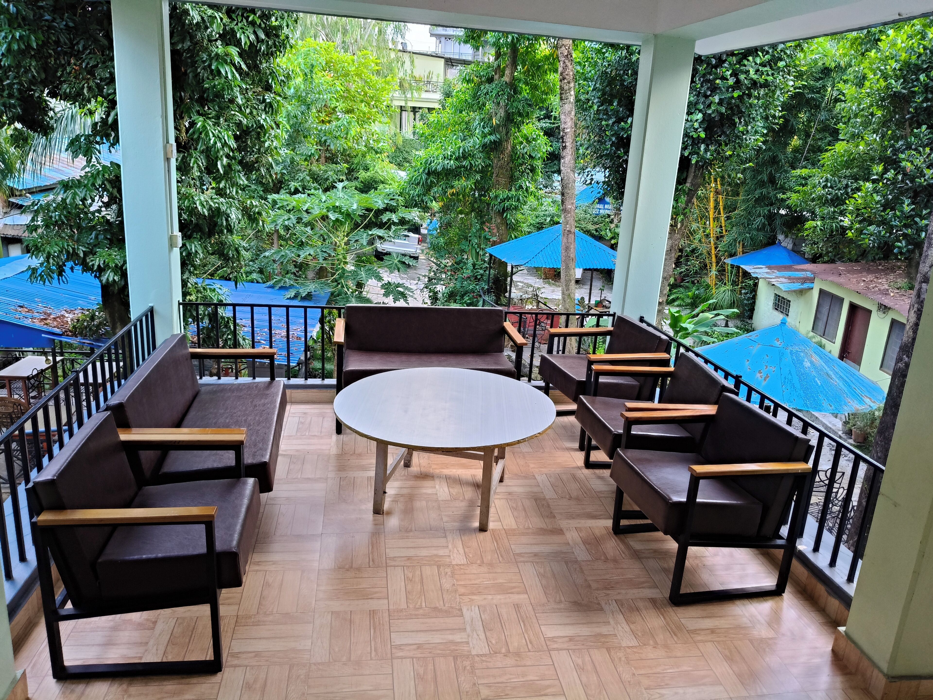 Deluxe Room, Garden View, Garden Area | Living area | TV
