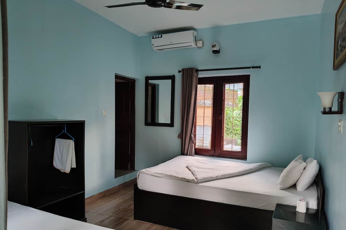 Chambre Deluxe, vue jardin, côté jardin