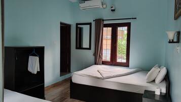 Deluxe Room, Garden View, Garden Area | Desk, laptop workspace, free WiFi, bed sheets