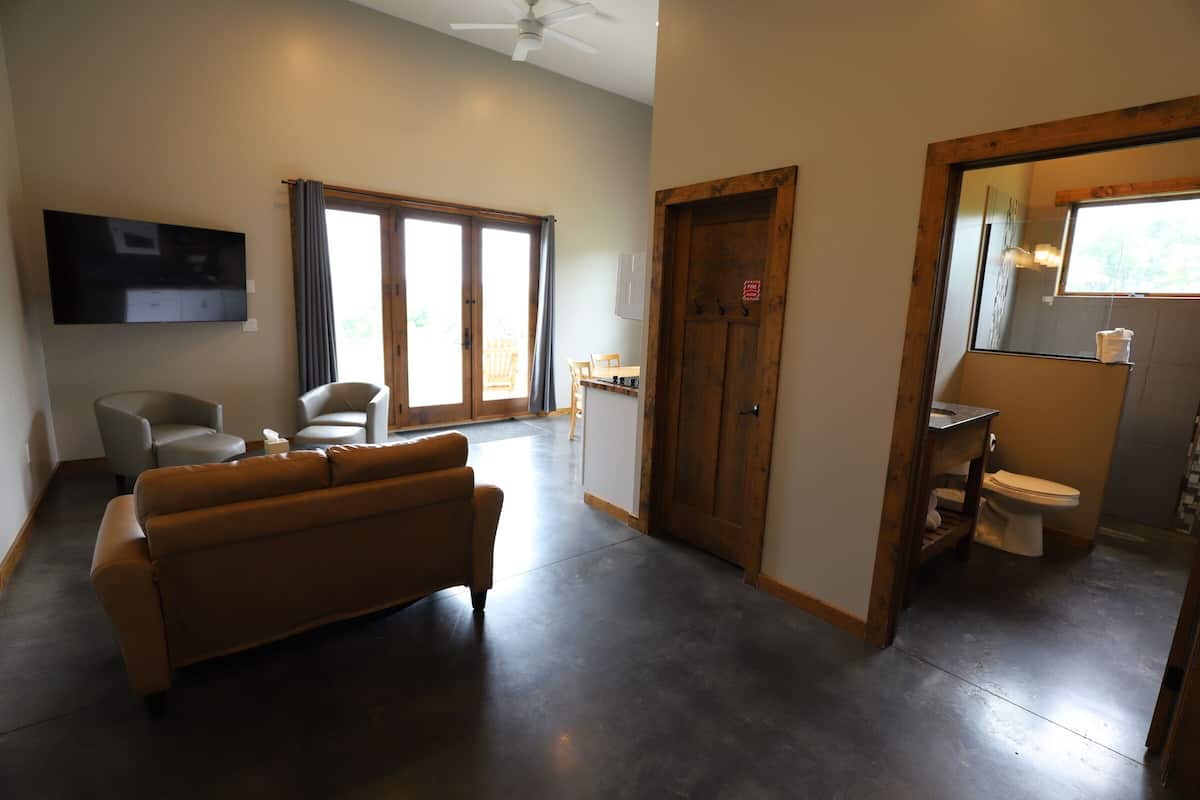 deluxe chalet, 2 queen beds, lake view | blackout curtains, iron/ironing board, free wifi, bed sheets