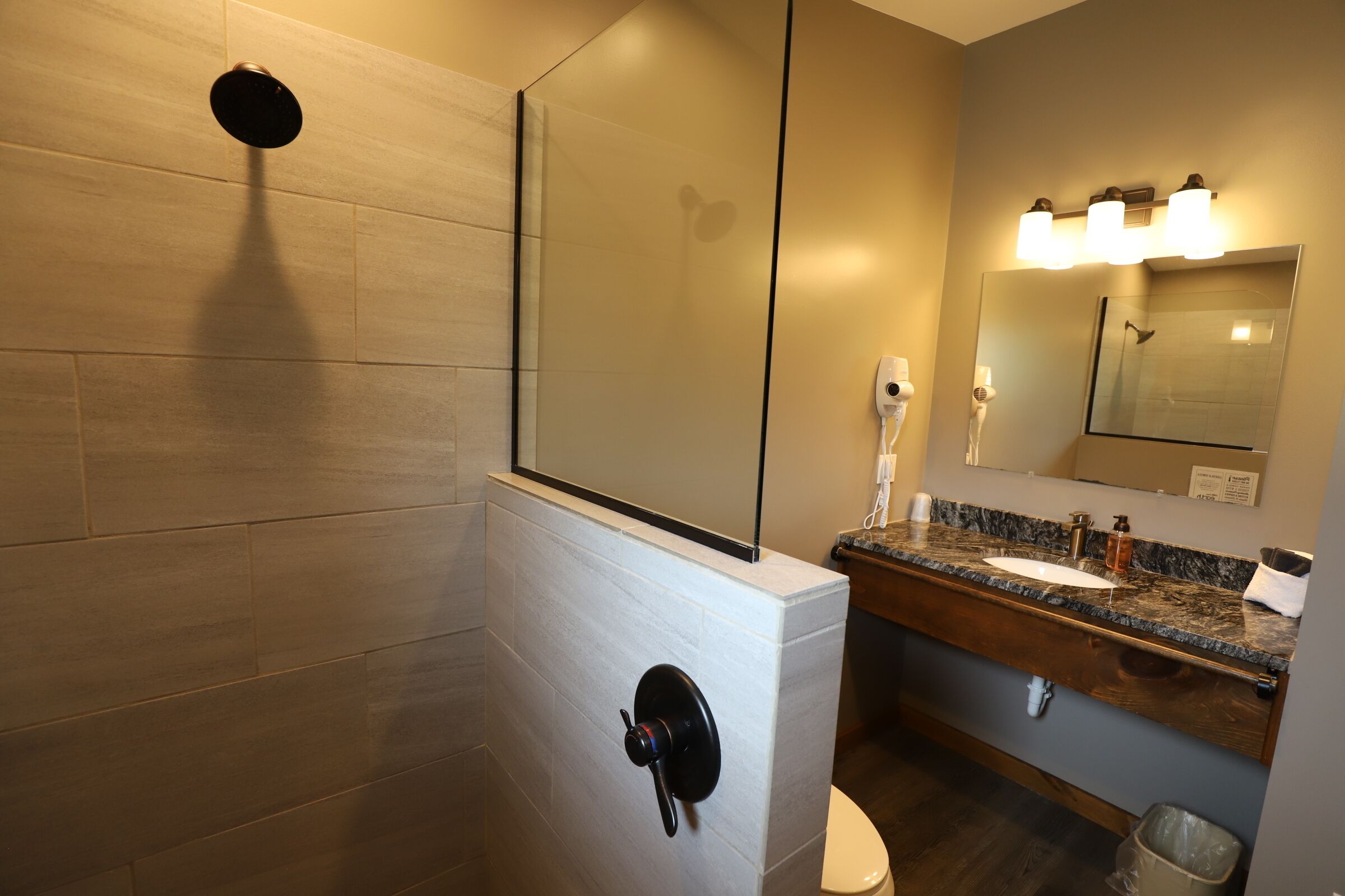 deluxe double room | bathroom | shower, hair dryer, towels