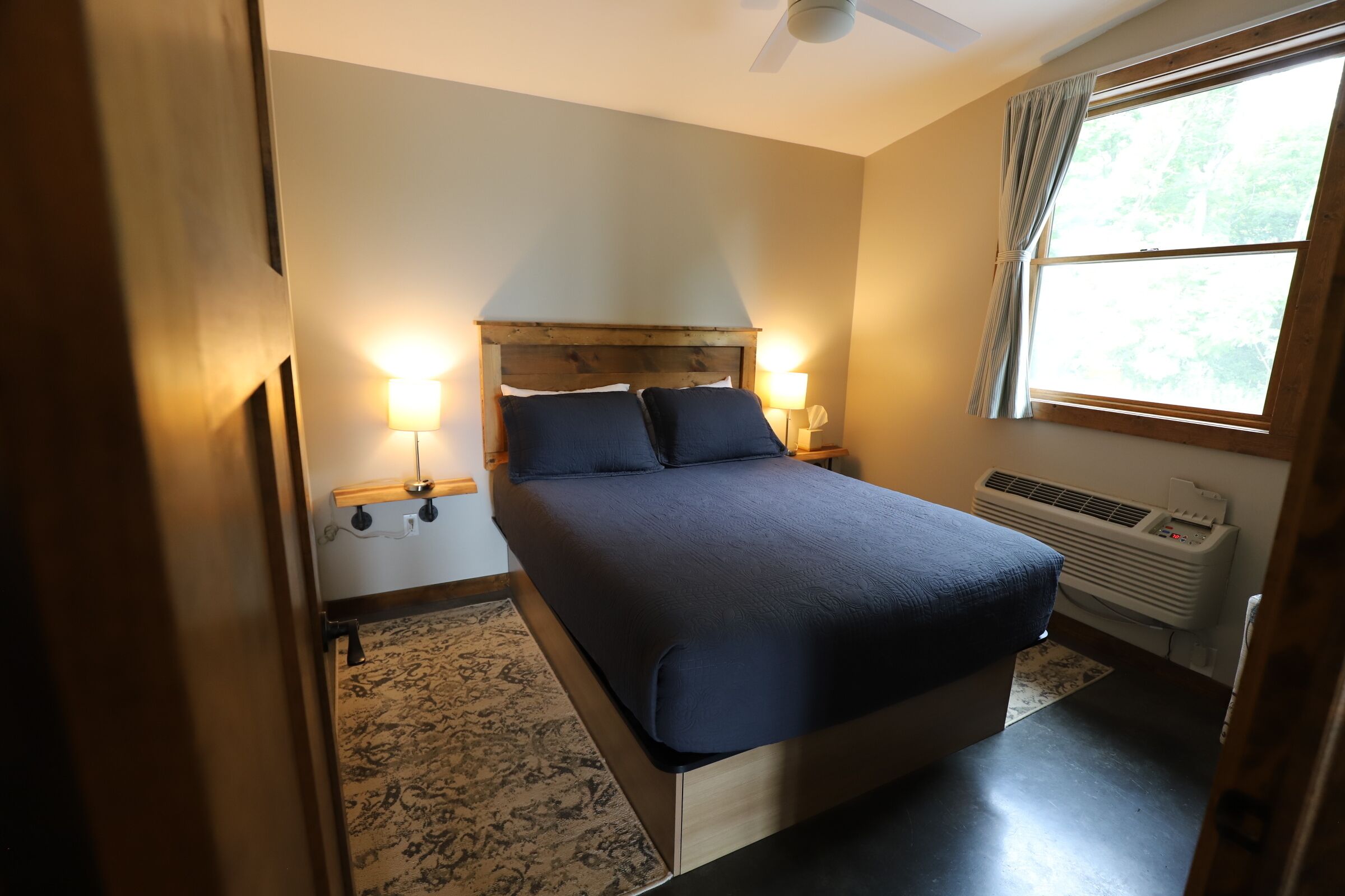 deluxe chalet, 2 queen beds, lake view | blackout curtains, iron/ironing board, free wifi, bed sheets