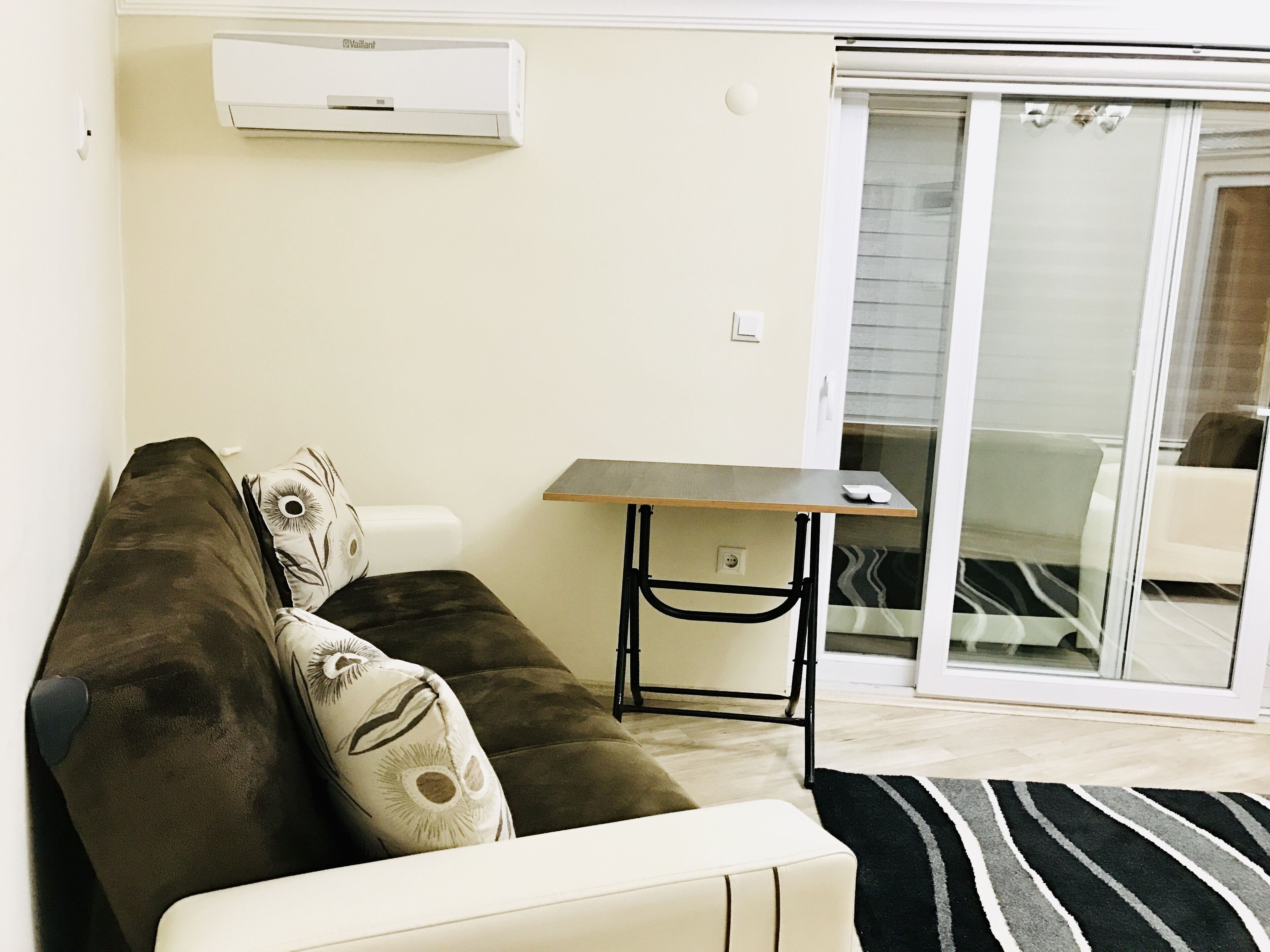 economy suite, 1 bedroom, terrace, city view | living area | flat-screen tv