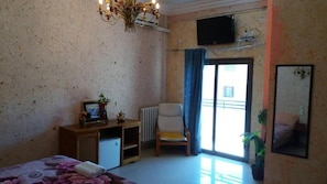 Minibar, desk, blackout drapes, iron/ironing board