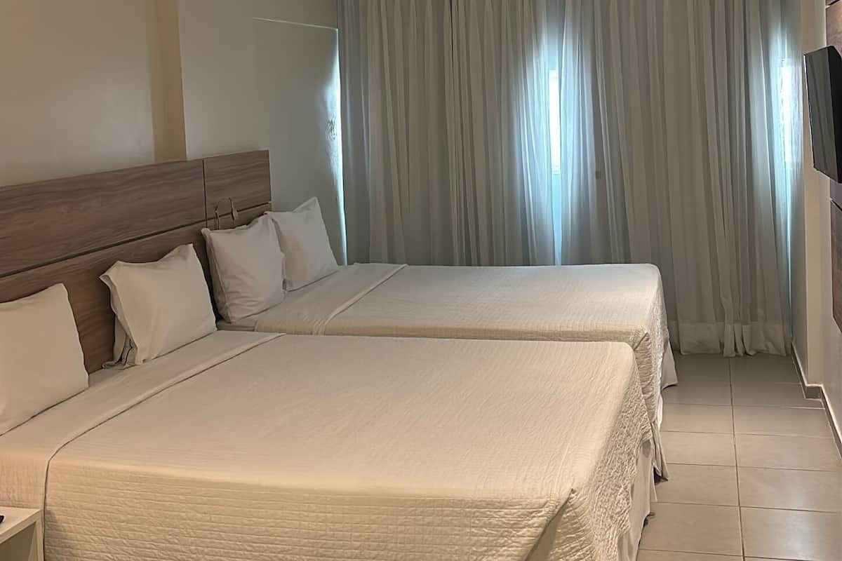 Standard Quádruplo - 2 Camas Queen | 1 phòng ngủ, minibar, két bảo mật tại phòng