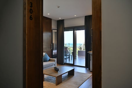 Superior Suite, 1 King Bed with Sofa bed | Living area | Flat-screen TV