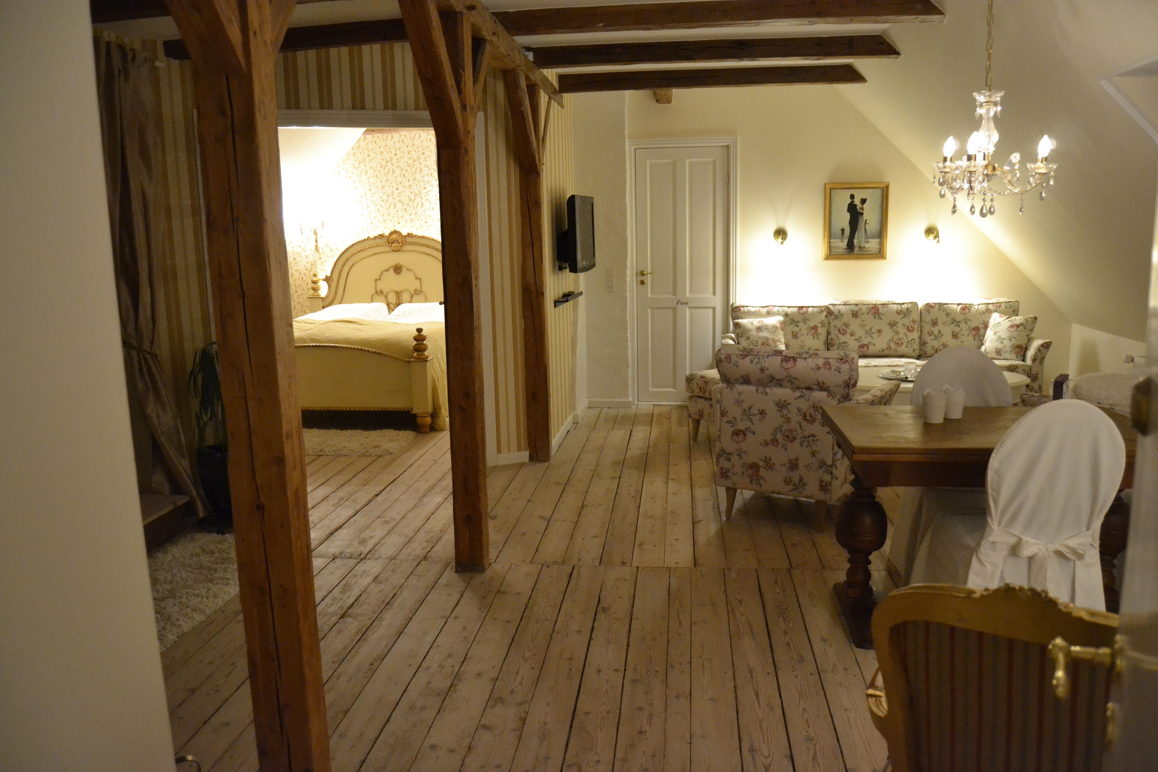 deluxe suite, 1 king bed with sofa bed, balcony, beach view | living area | 20-inch flat-screen tv with cable channels, tv