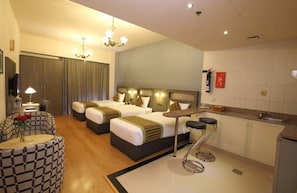 Studio (3 Adults) | Minibar, in-room safe, desk, soundproofing