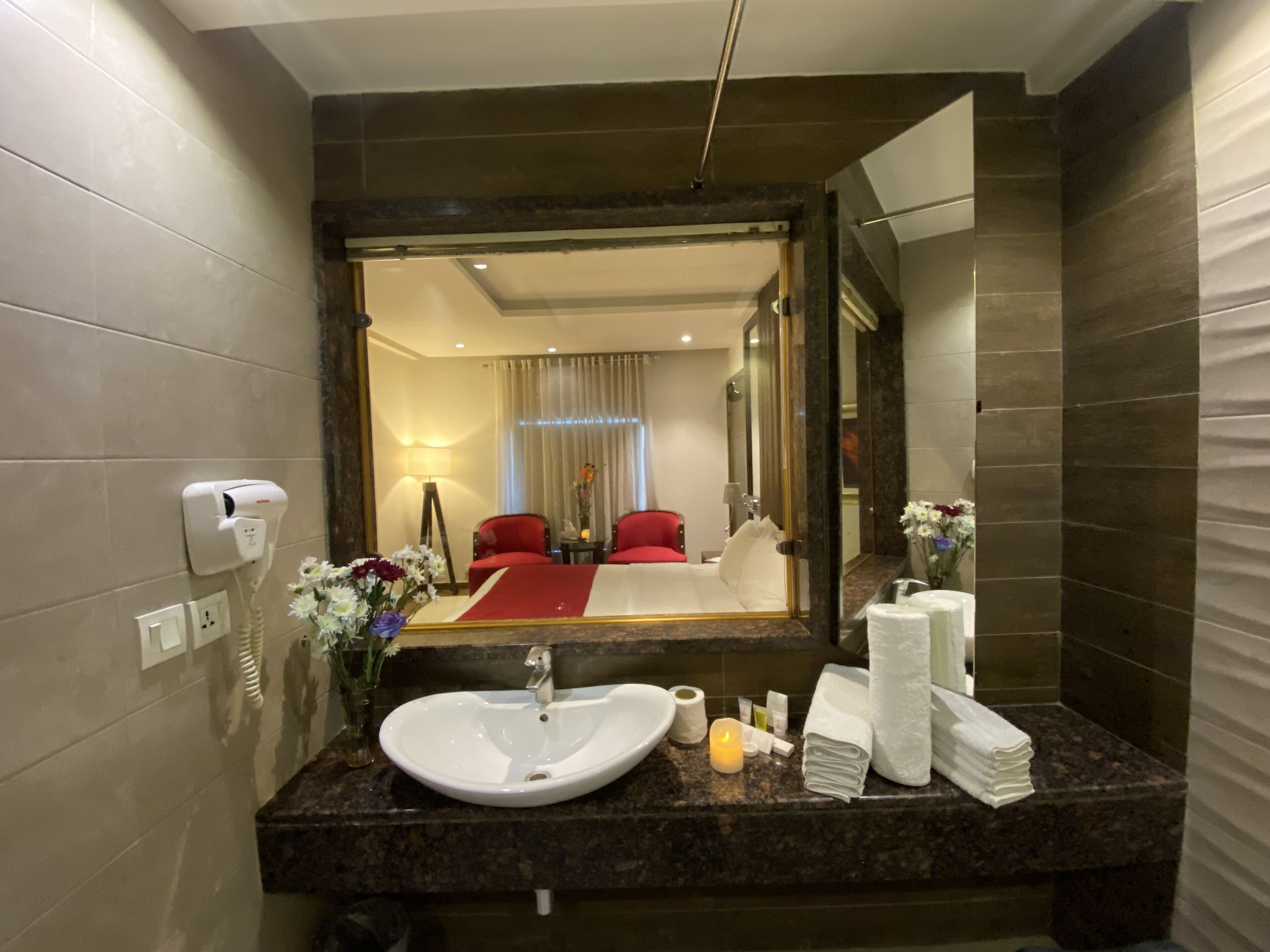 deluxe single room | bathroom | shower, rainfall showerhead, free toiletries, bathrobes