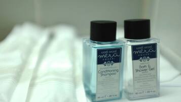 Shower, towels, soap, shampoo