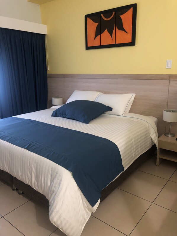 Premium bedding, pillowtop beds, minibar, in-room safe