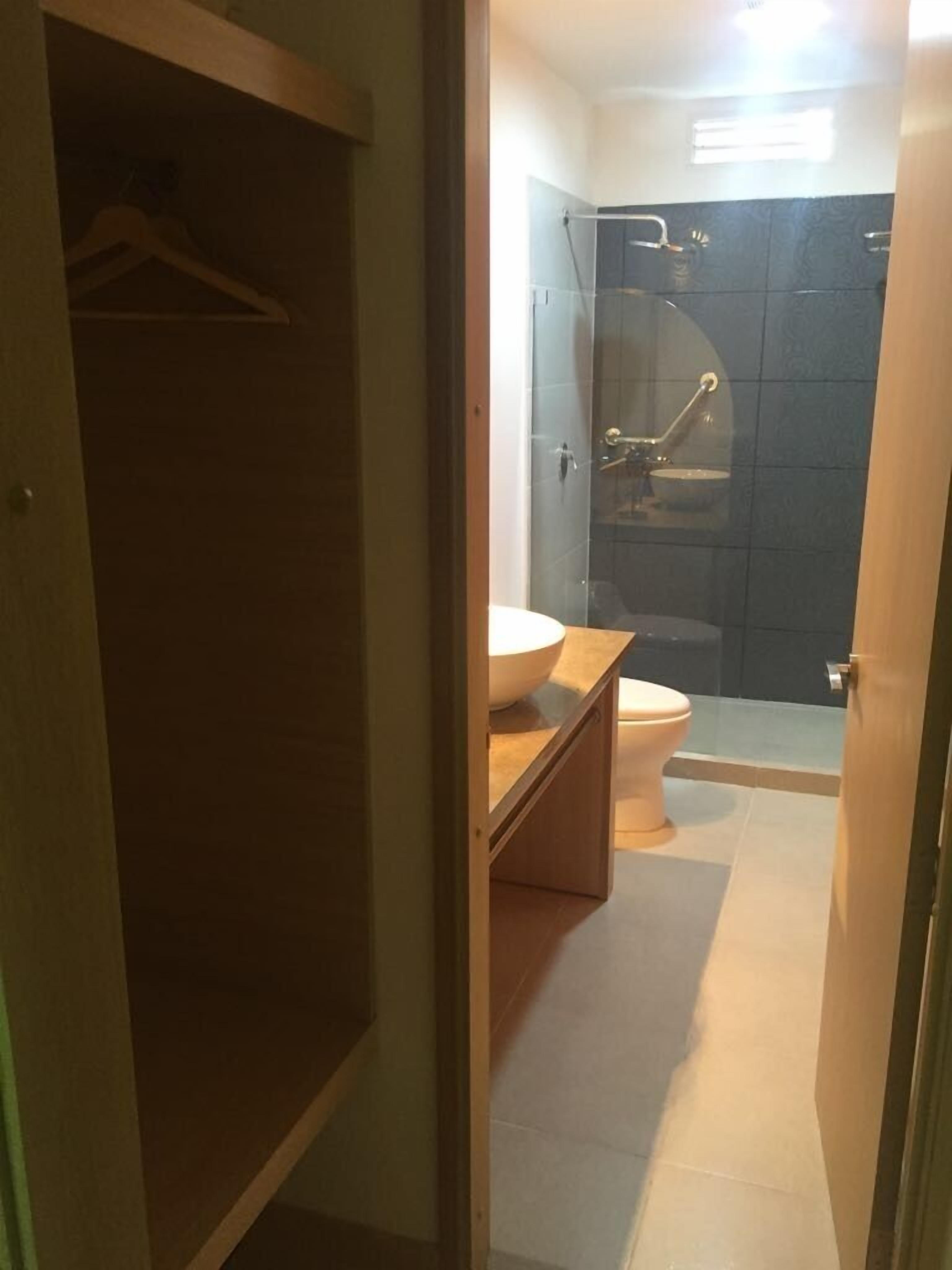 Standard Double Room, 2 Queen Beds | Bathroom | Shower, rainfall showerhead, free toiletries, towels