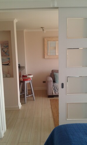 Economy Apartment, 1 Bedroom, Beach View, Sea Facing | Living area | Flat-screen TV - Rent Vacation by Apartments Concon (Concon)