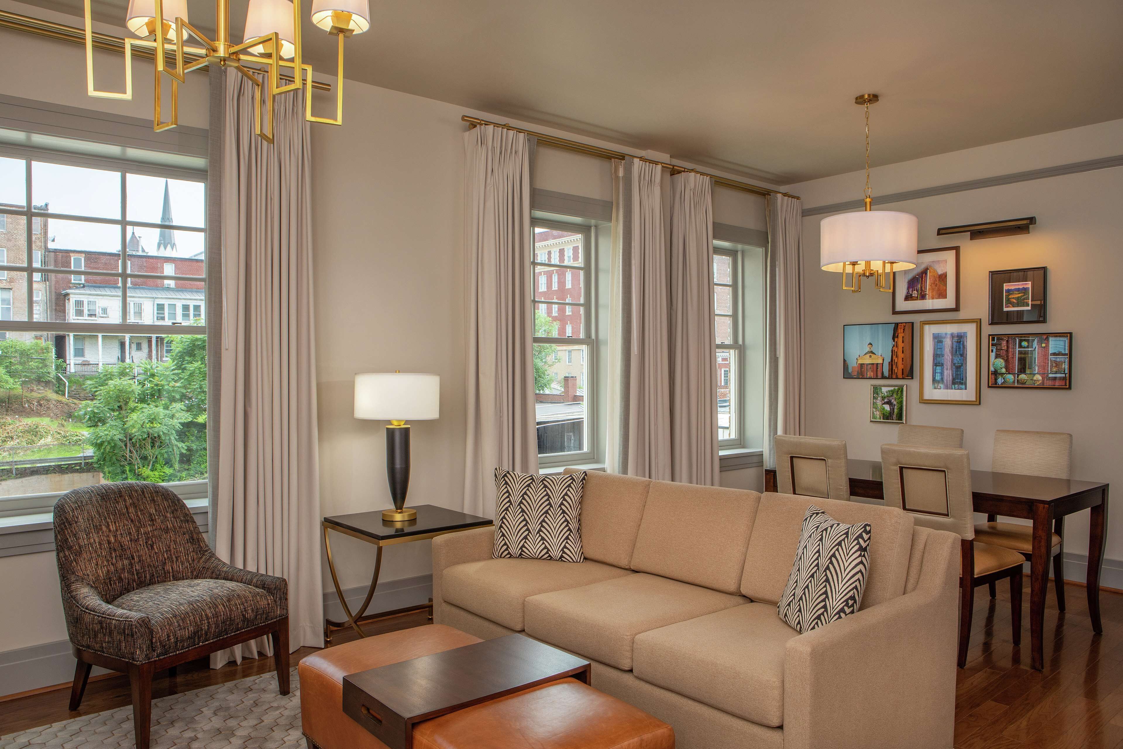 deluxe suite, 1 king bed | living area | 50-inch flat-screen tv with premium tv channels, tv, ipod dock