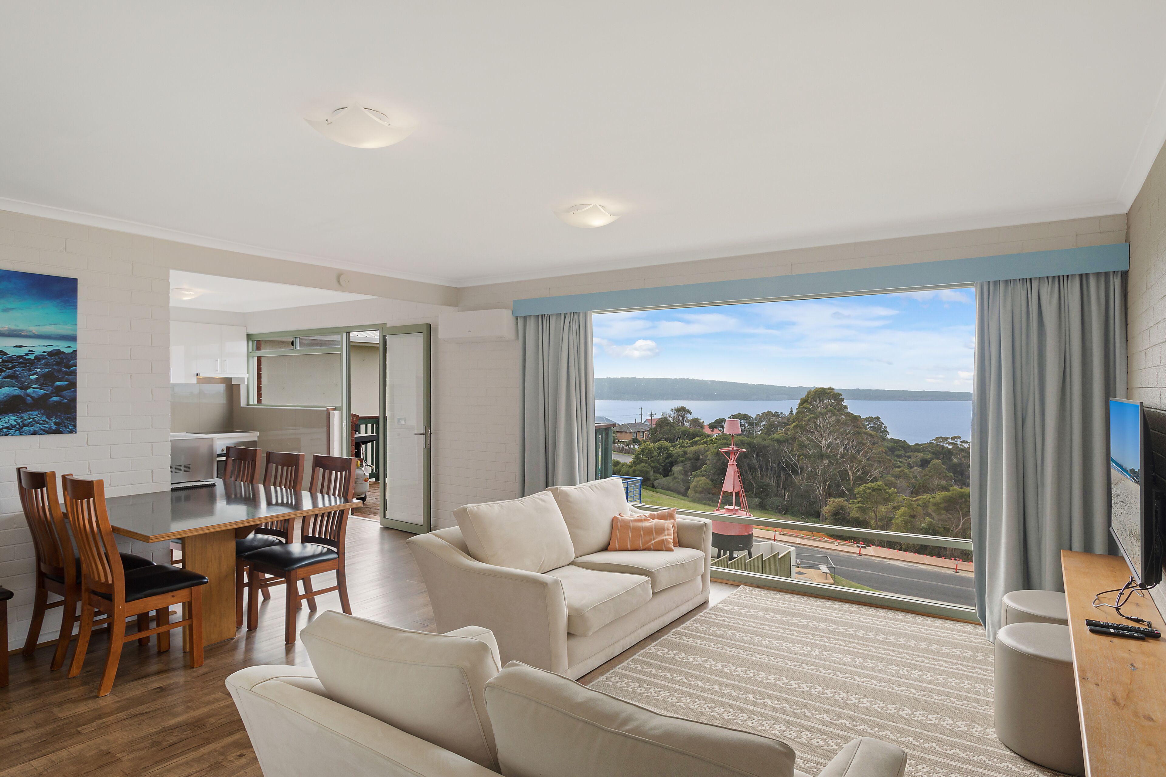 2 Bedroom Apartment | Living area | Flat-screen TV