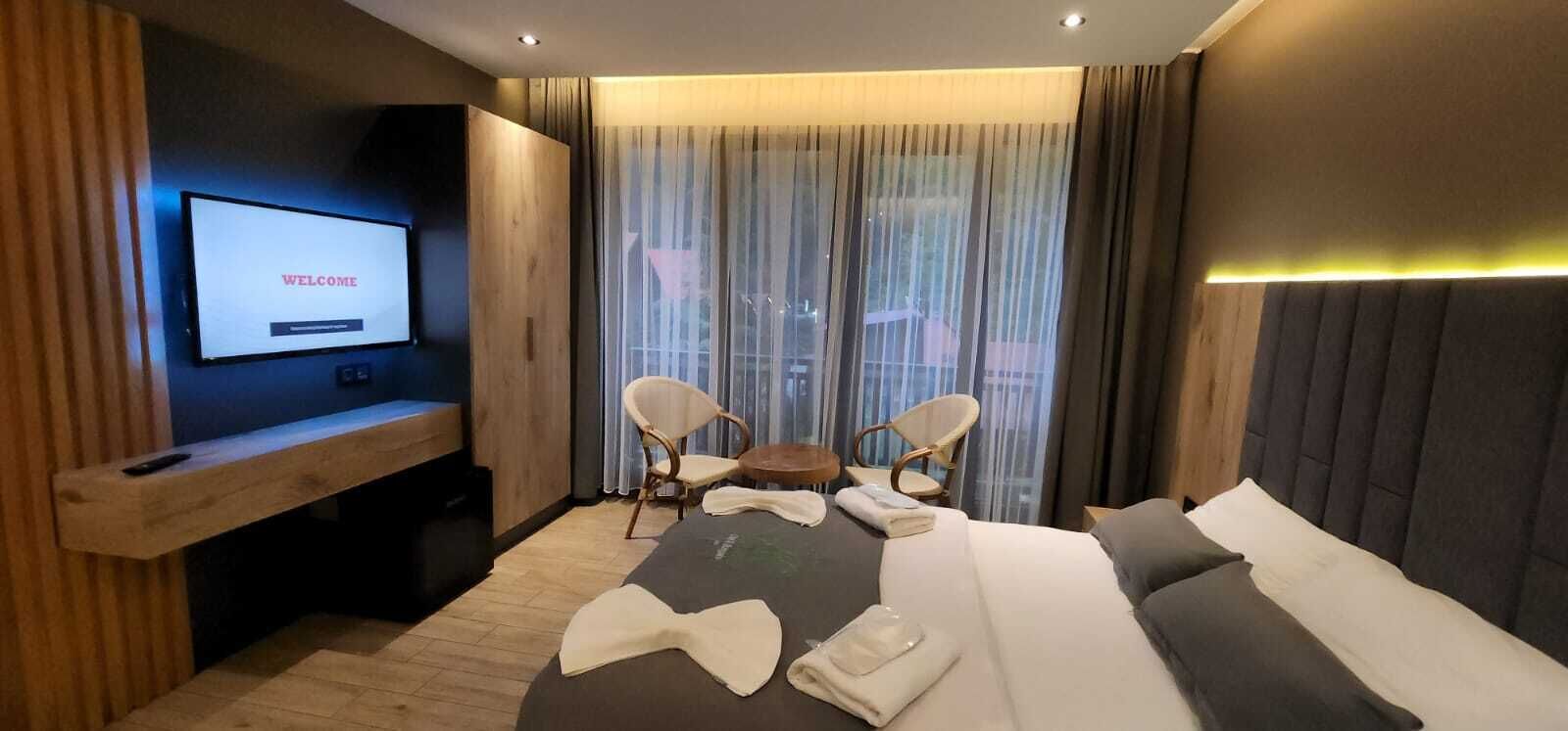 Deluxe Studio, Garden View | Premium bedding, minibar, blackout drapes, soundproofing