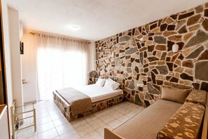 Economy Studio (Semi Basement ) | Premium bedding, iron/ironing board, free cots/infant beds, free WiFi
