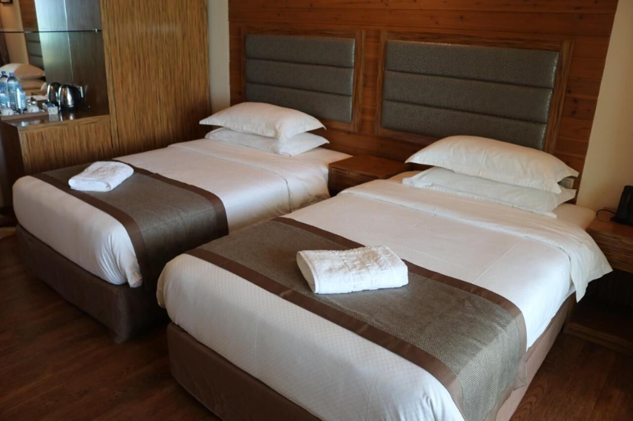 premium bedding, down duvets, minibar, in-room safe