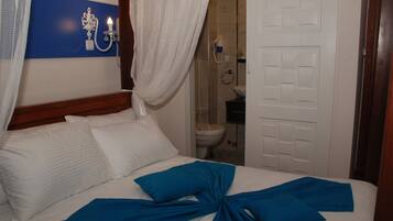 Economy Room | Minibar, free WiFi