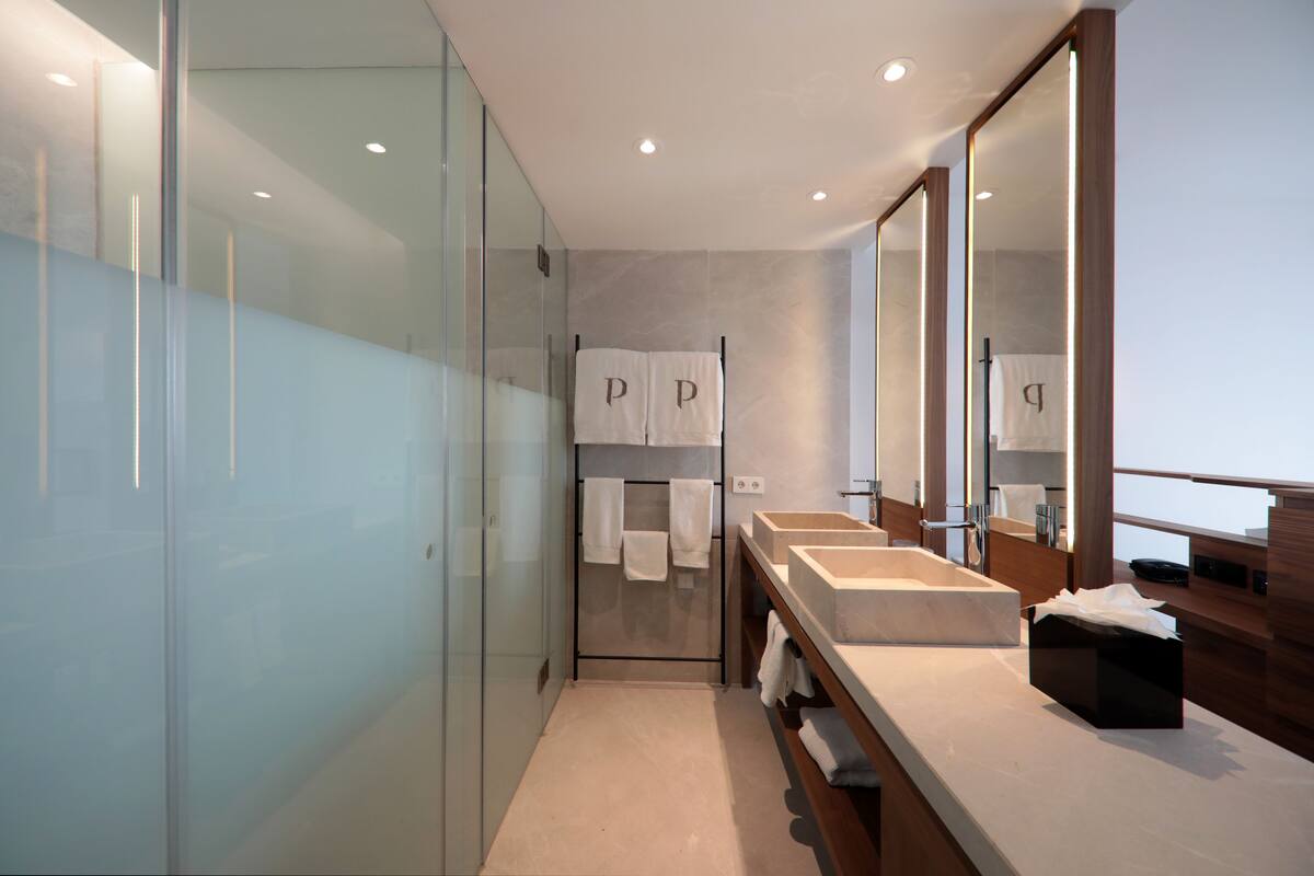 shower, rainfall showerhead, designer toiletries, hair dryer