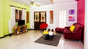 Arcadia Castle Villa | Living room | 32-inch LCD TV with satellite channels, TV - Arcadia Castle Villa (Choeng Thale)