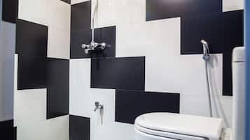 Budget Twin Room with Common Bath | Bathroom | Shower, free toiletries, hair dryer, bidet