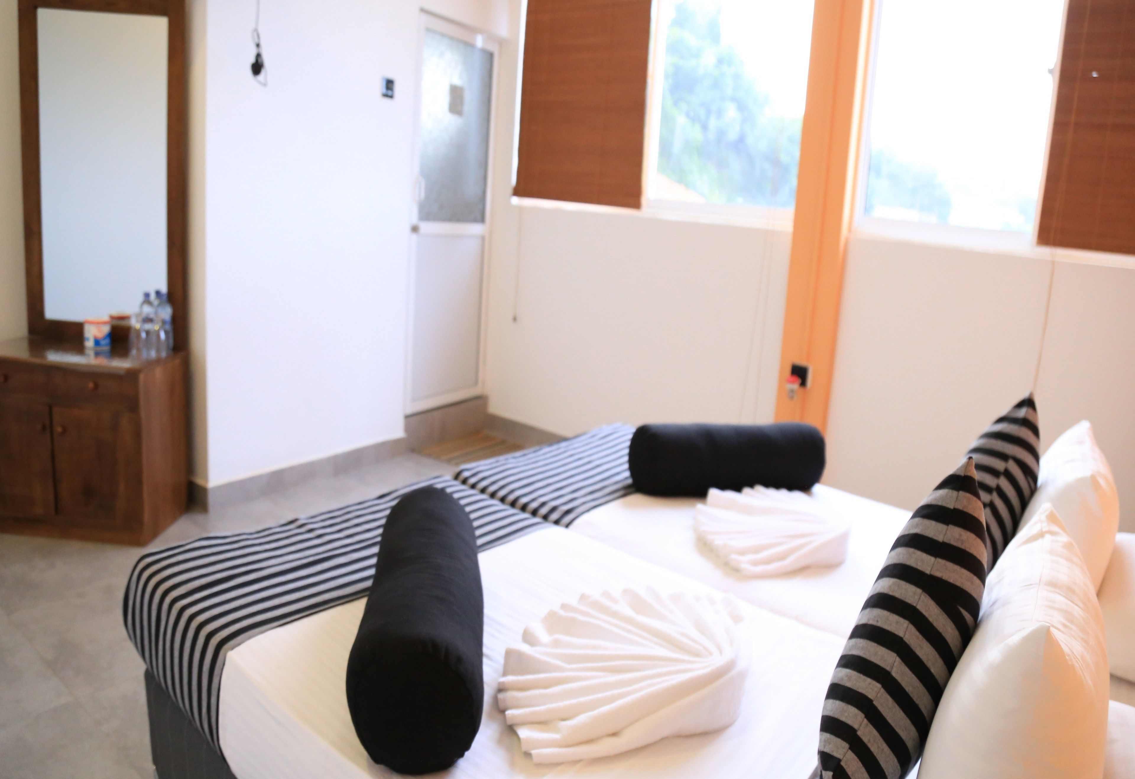 Deluxe Double Room (With Attached Bathroom) | Iron/ironing board, bed sheets