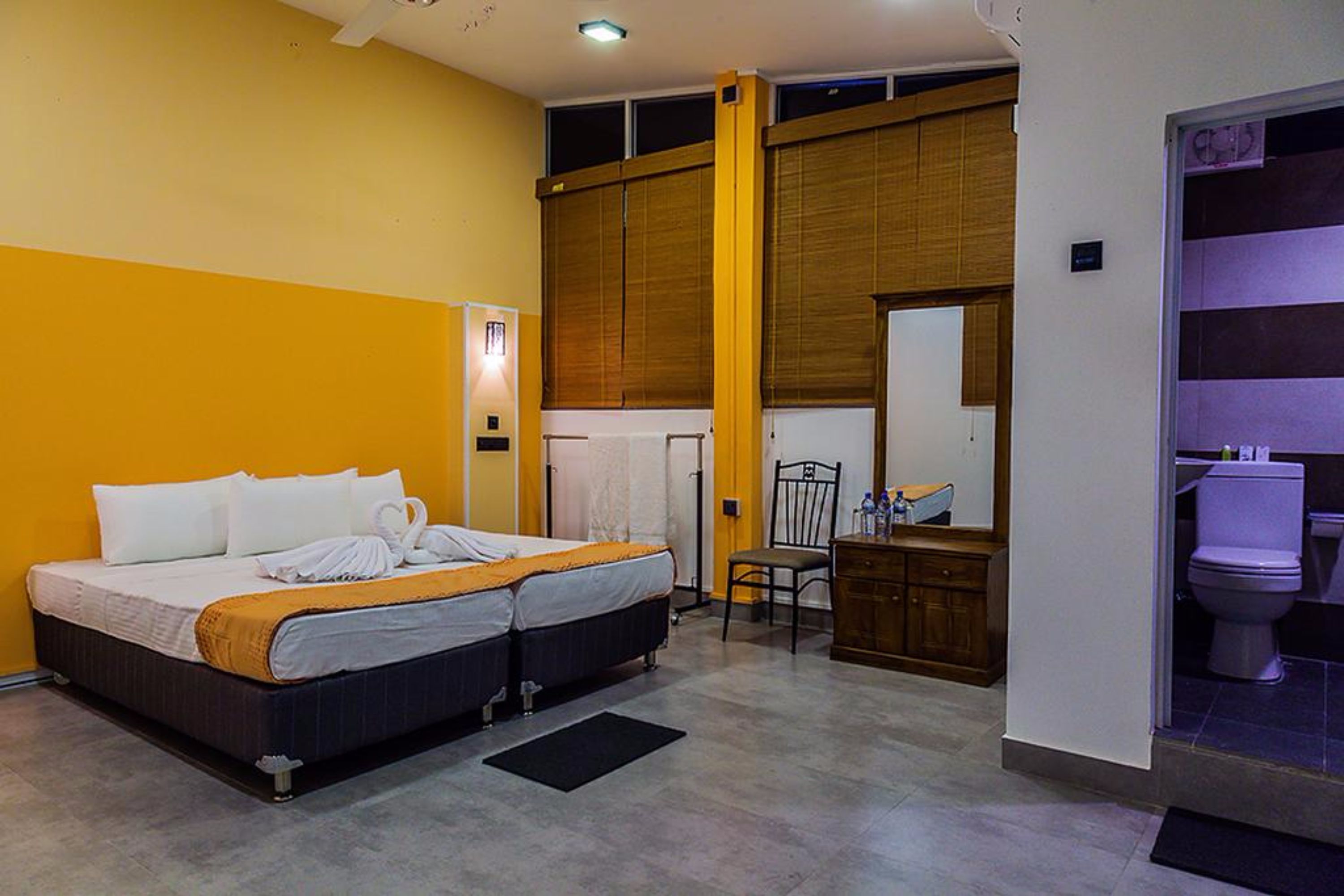 Deluxe Double Room (With Attached Bathroom) | Iron/ironing board, bed sheets