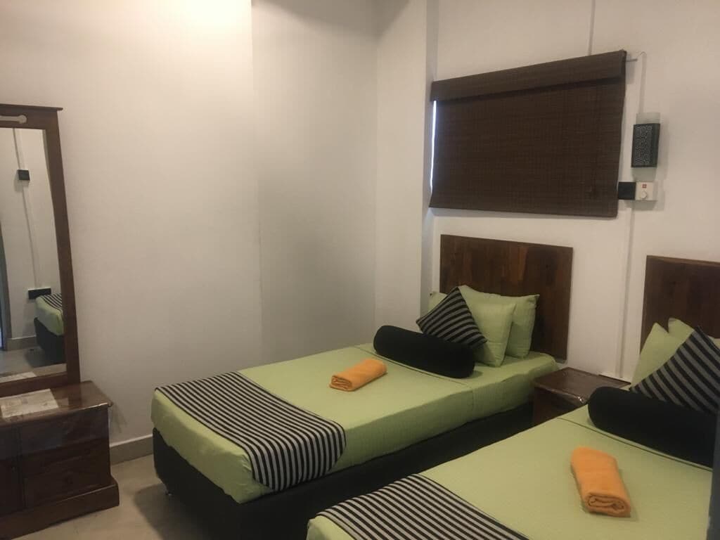 مكواة/لوح كي وملاءات أسرّة