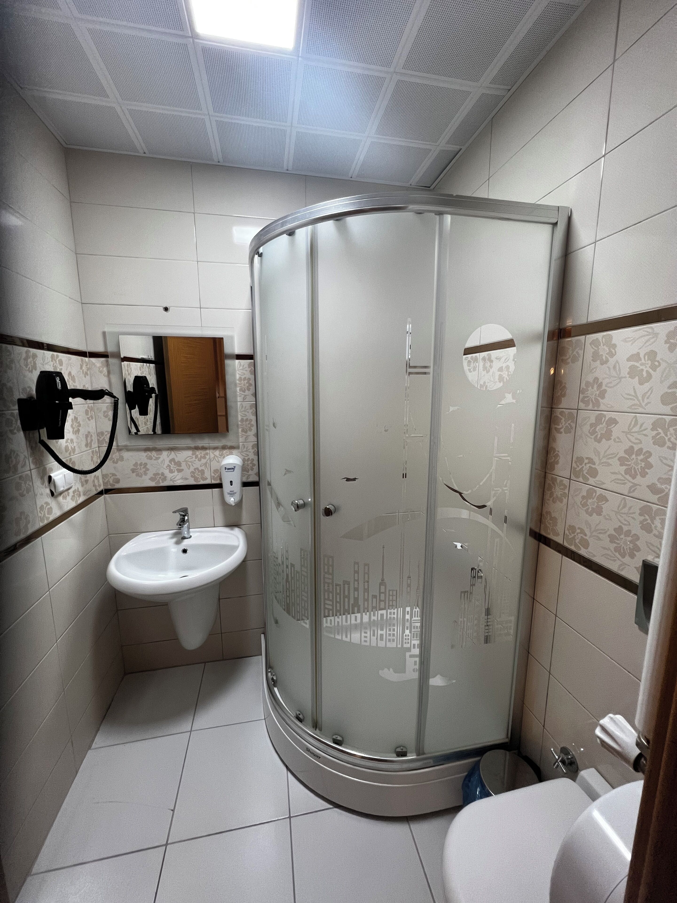 apartment, river view | bathroom | shower, rainfall showerhead, free toiletries, hair dryer