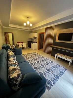 Apartment, Gartenblick, Erdgeschoss | Wohnbereich | Flachbildfernseher