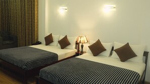 Deluxe Twin kamer | Luxe beddengoed, een kluis op de kamer, individueel gedecoreerd