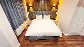 Deluxe tweepersoonskamer | 1 slaapkamer, luxe beddengoed, een bureau, een laptopwerkplek