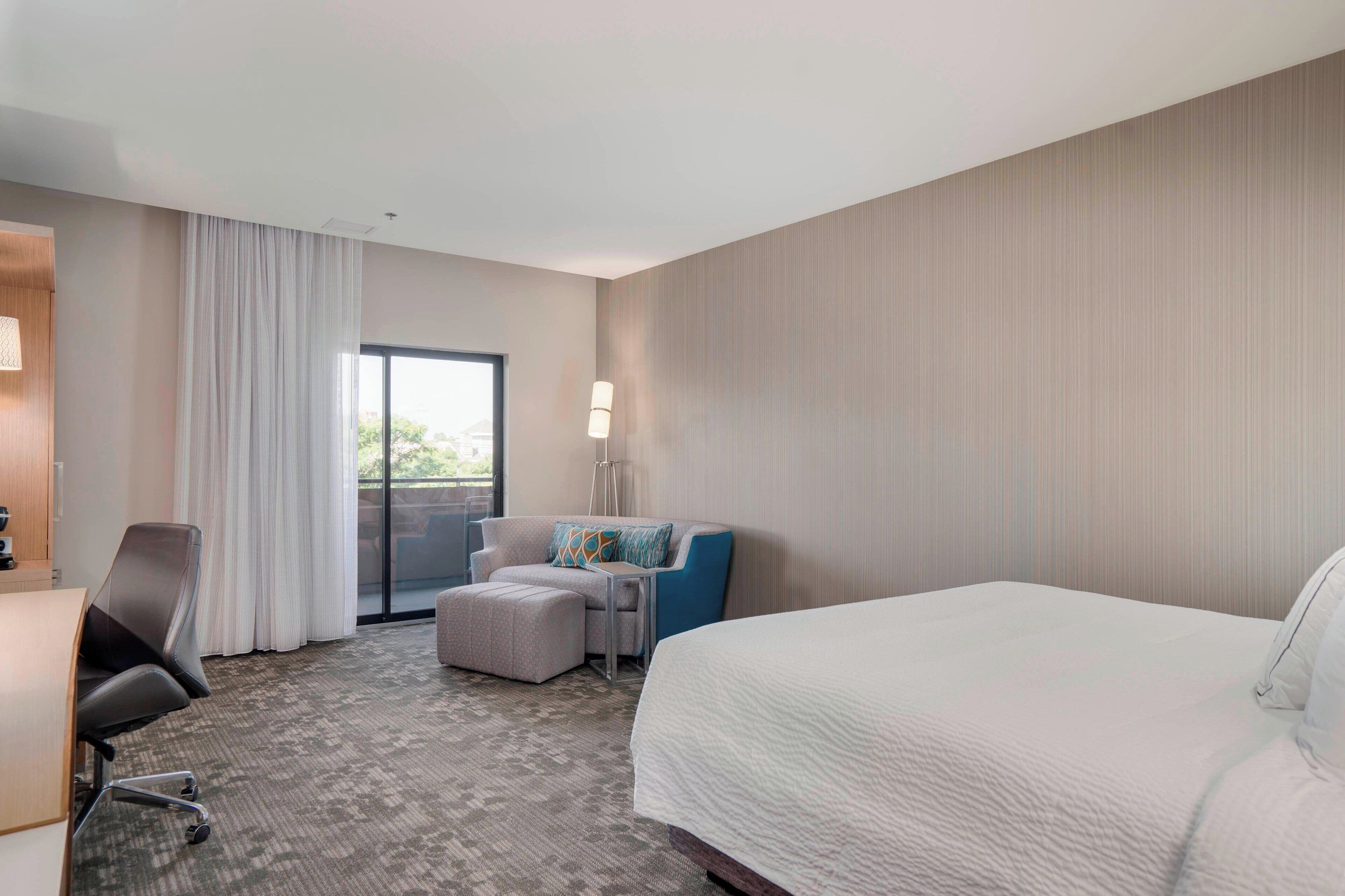 premium bedding, desk, laptop workspace, blackout curtains