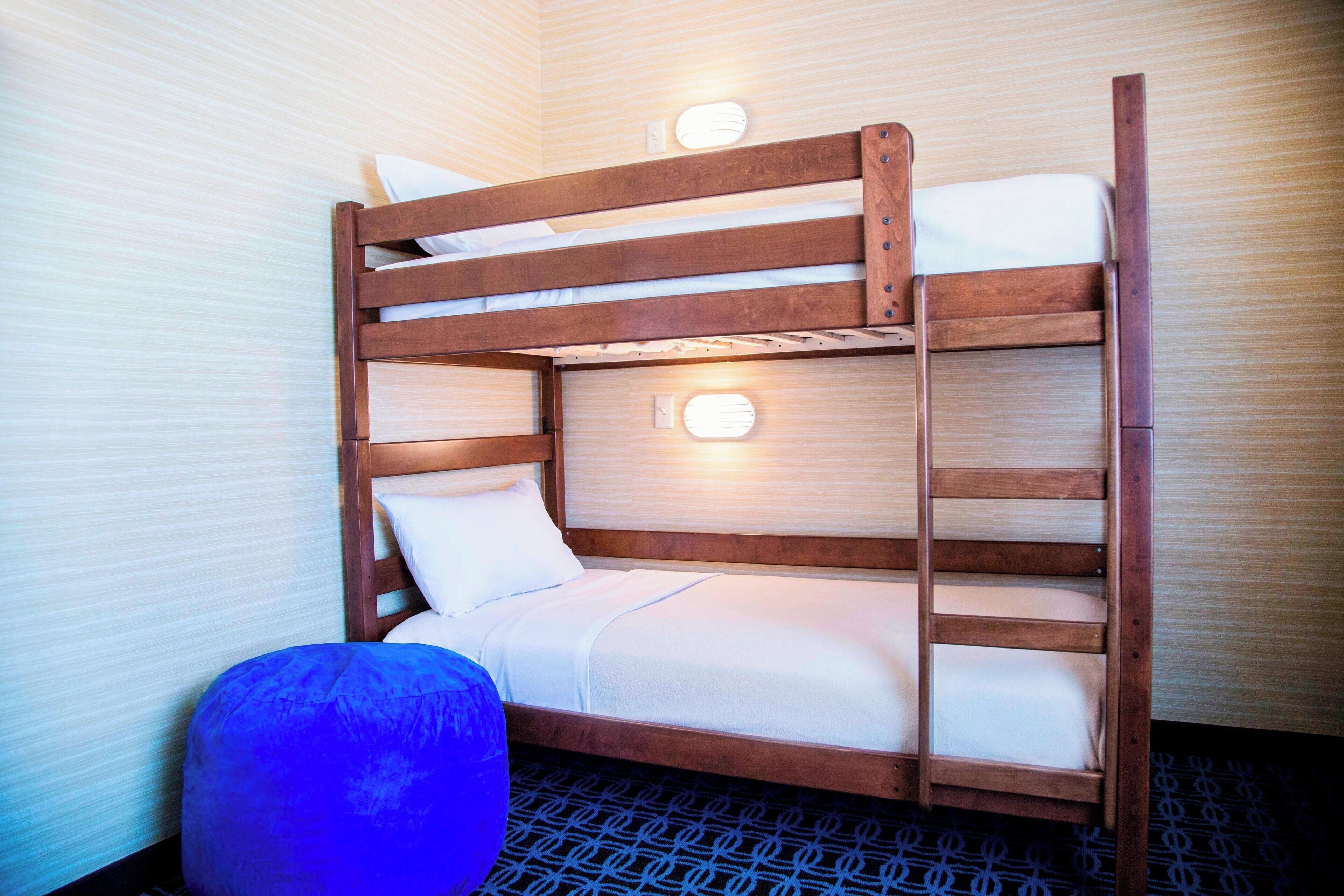 desk, blackout curtains, iron/ironing board, free cots/infant beds