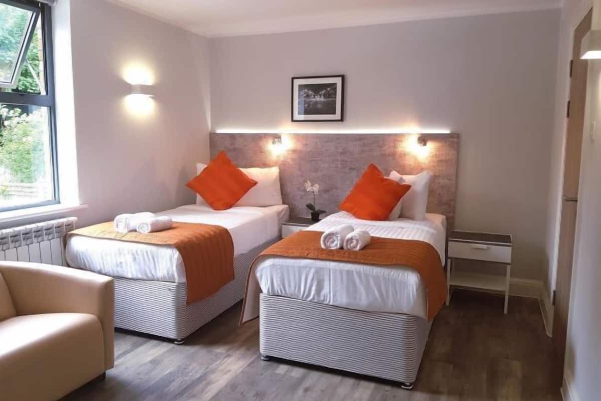 Premium bedding, individually decorated, individually furnished, desk